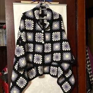 handmade crochet granny square throw blanket in black, white, and grey shades